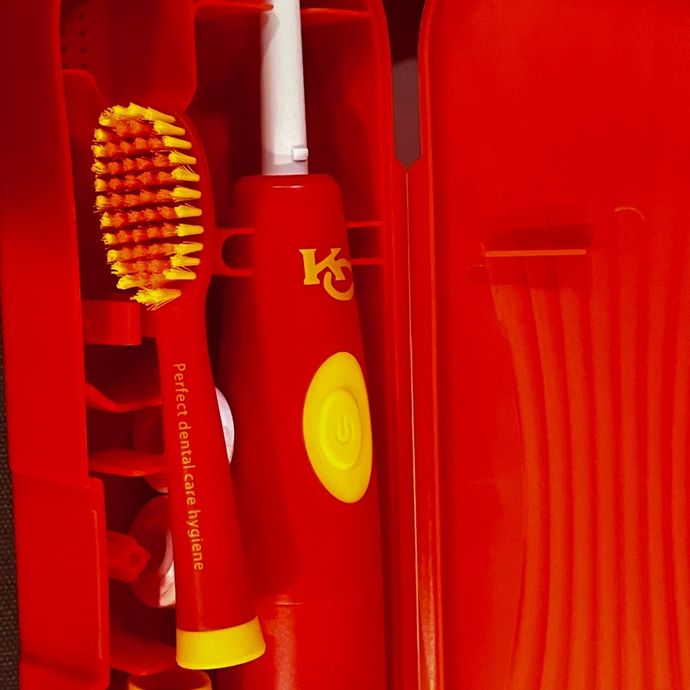 Kids and adults Red and Yellow battery Electric Toothbrush